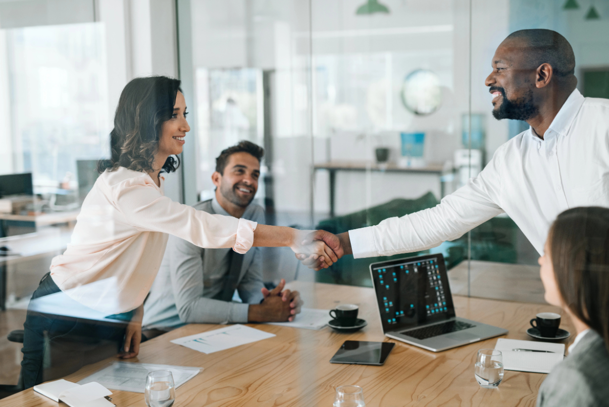 Handshake in upscale office